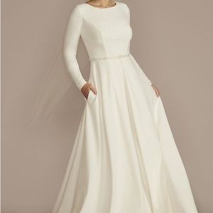 Belted long sleeve crepe modest wedding dress

STYLE# MSLWG4098